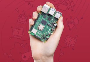 A hand holding a Raspberry Pi computer